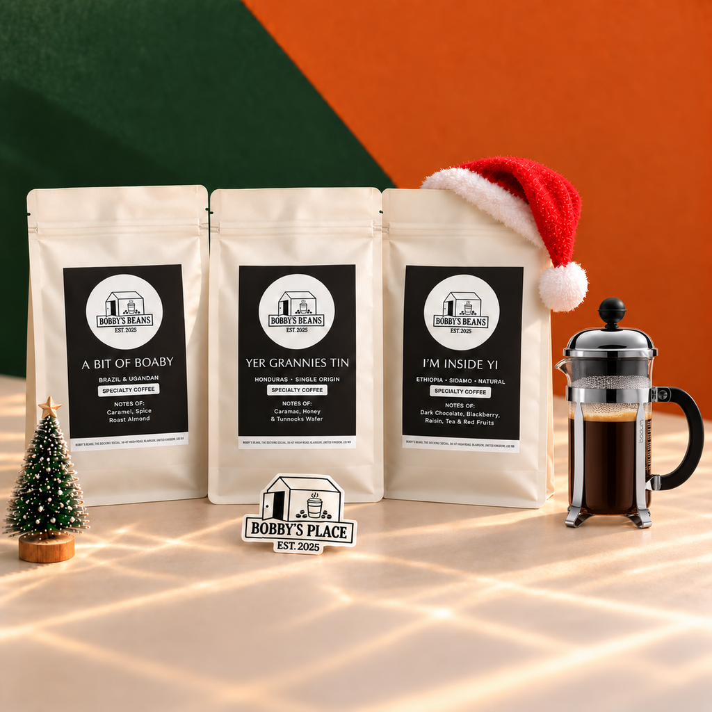 A Taste of Boaby bundle with an optional Bodum Chambord 3 cup, glass and chrome and Bobby's Place sticker.