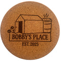 The Giant Coaster — round cork coaster engraved with the Bobby's Place Est. 2025 design