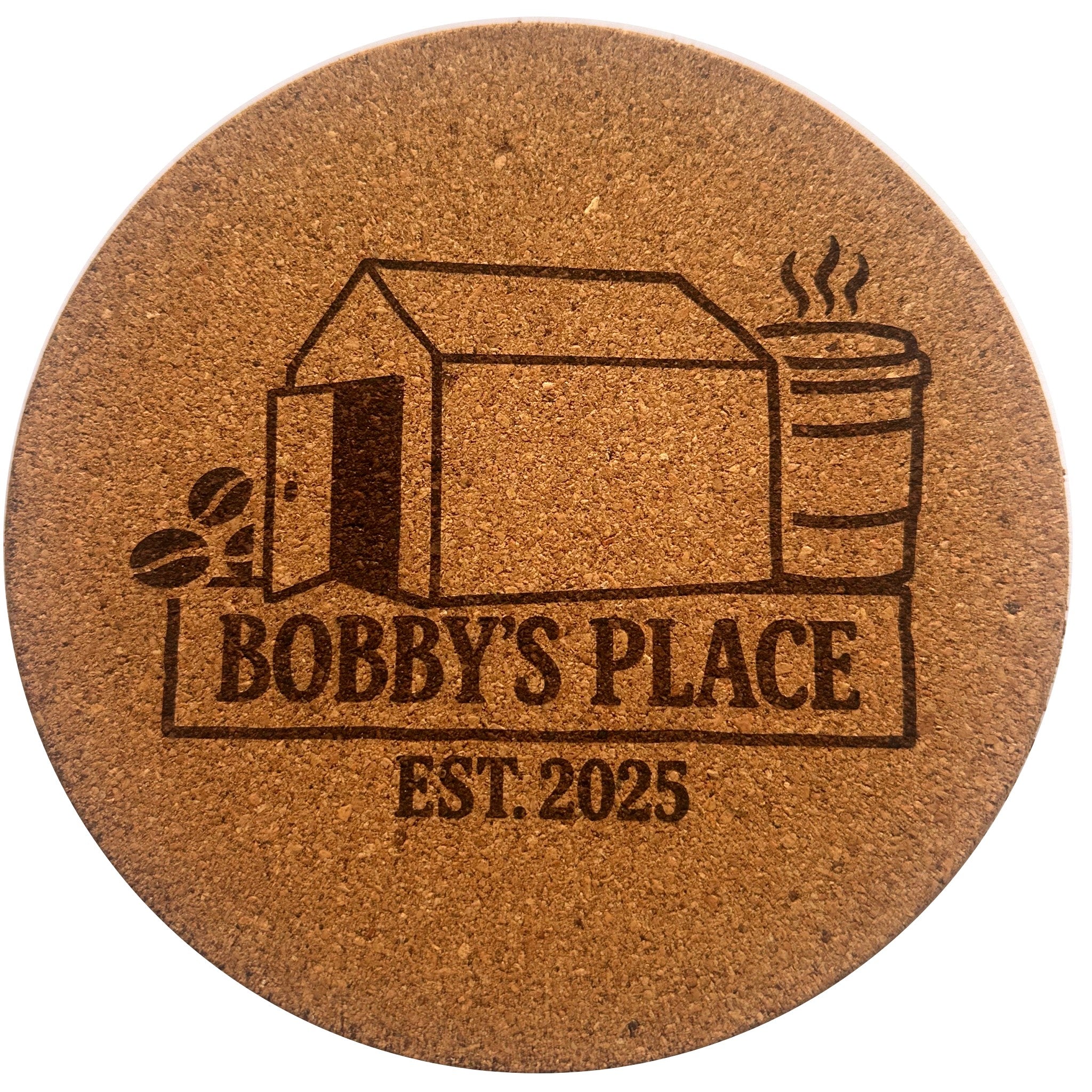 The Giant Coaster — round cork coaster engraved with the Bobby's Place Est. 2025 design
