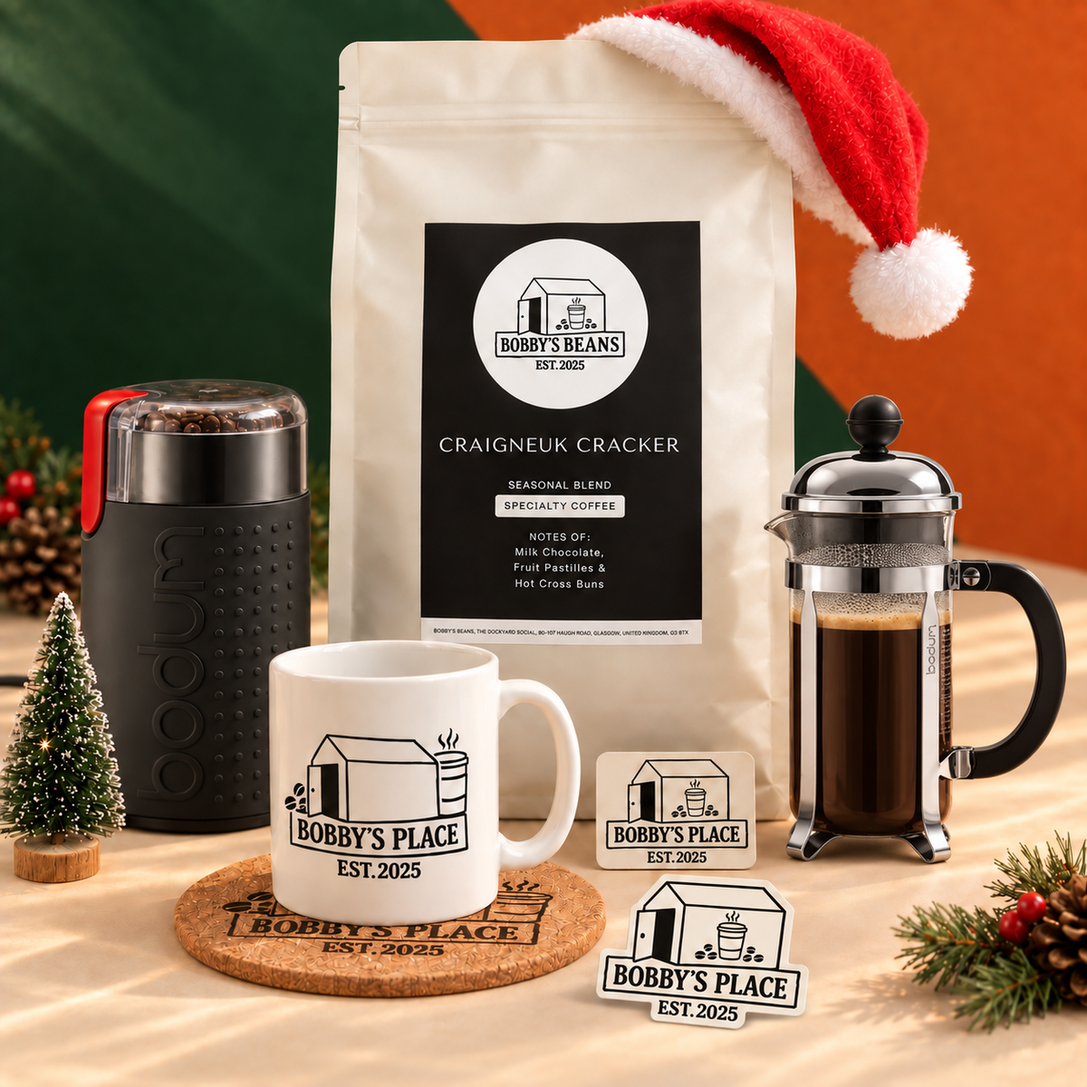 The Christmas Cracker bundle with an optional Bodum Chambord 3 cup, glass and chrome and Bobby's Place sticker.