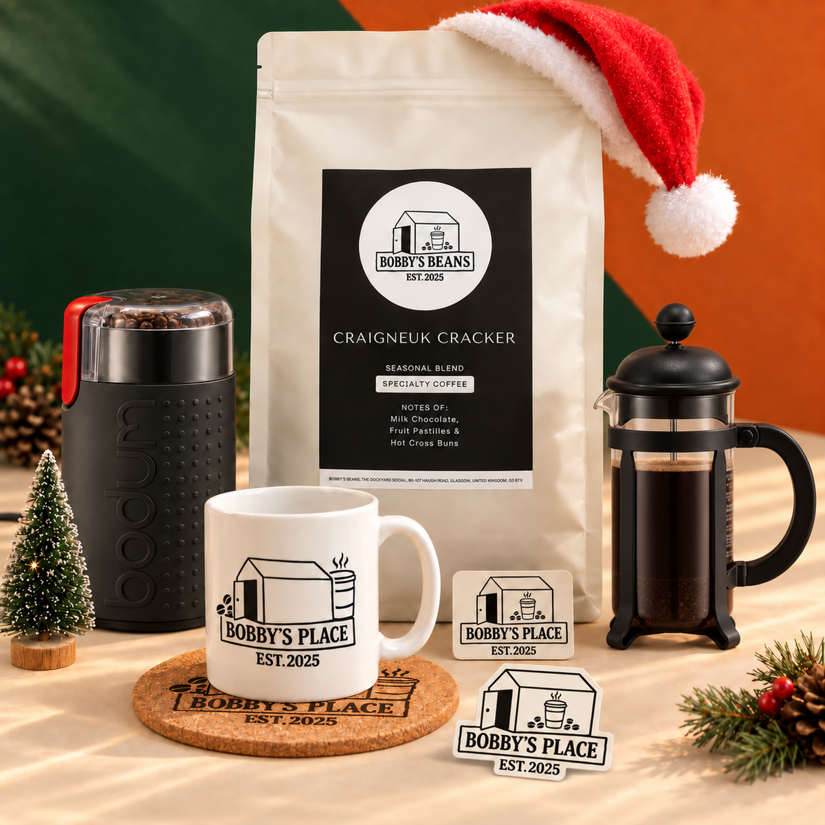 The Christmas Cracker bundle with an optional Bodum Java 3 cup, black and Bobby's Place sticker.