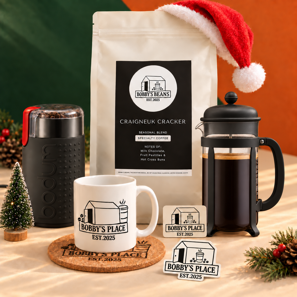The Christmas Cracker bundle with an optional Bodum Java 8 cup, black and Bobby's Place sticker.