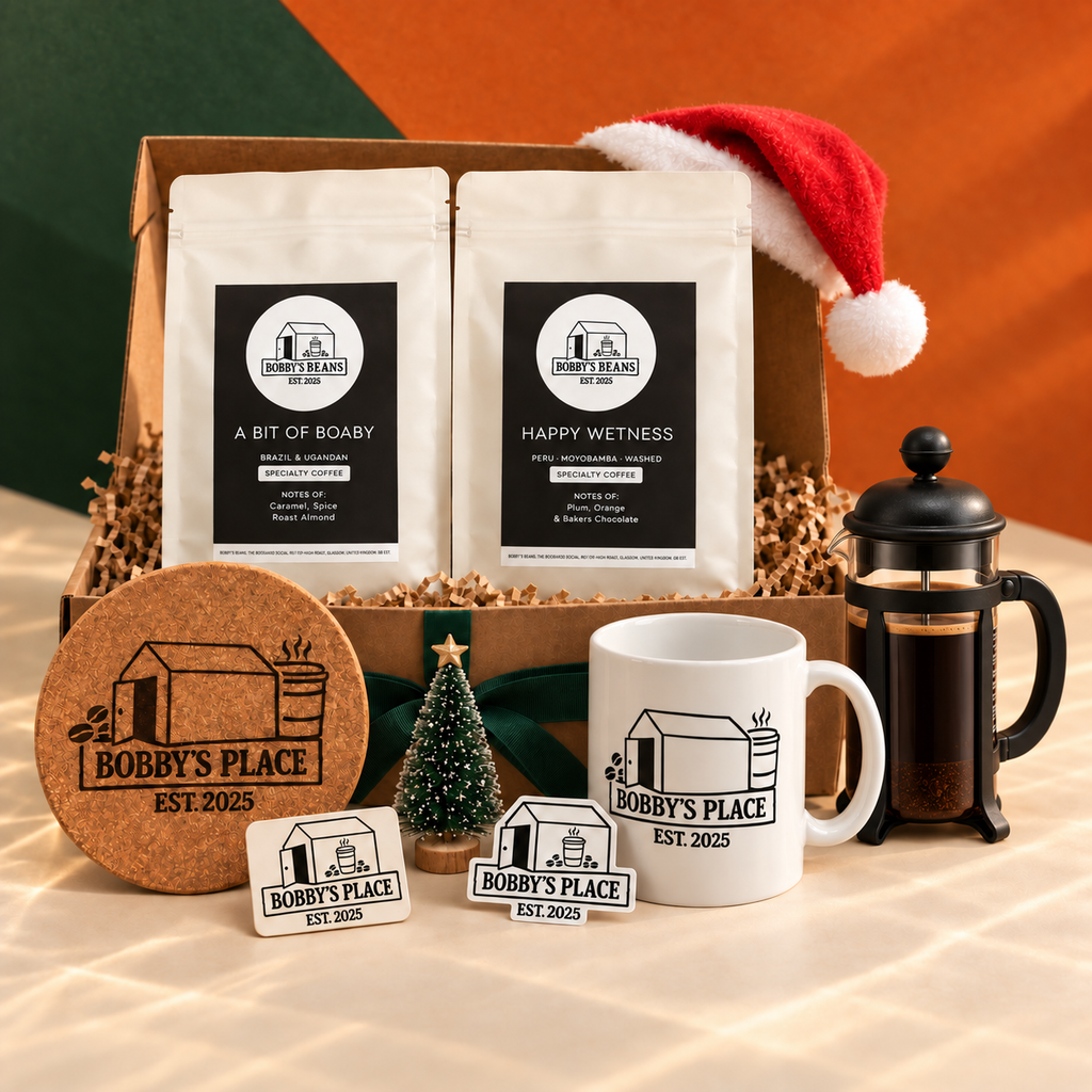 An Xmas Box Of Boaby bundle with an optional black Bodum Java 3 cup cafetière and Bobby's Place sticker.