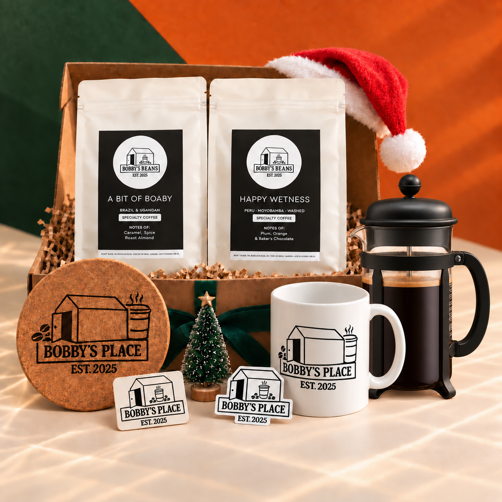 An Xmas Box Of Boaby with an optional Bodum Java 8 cup, black and Bobby's Place sticker.